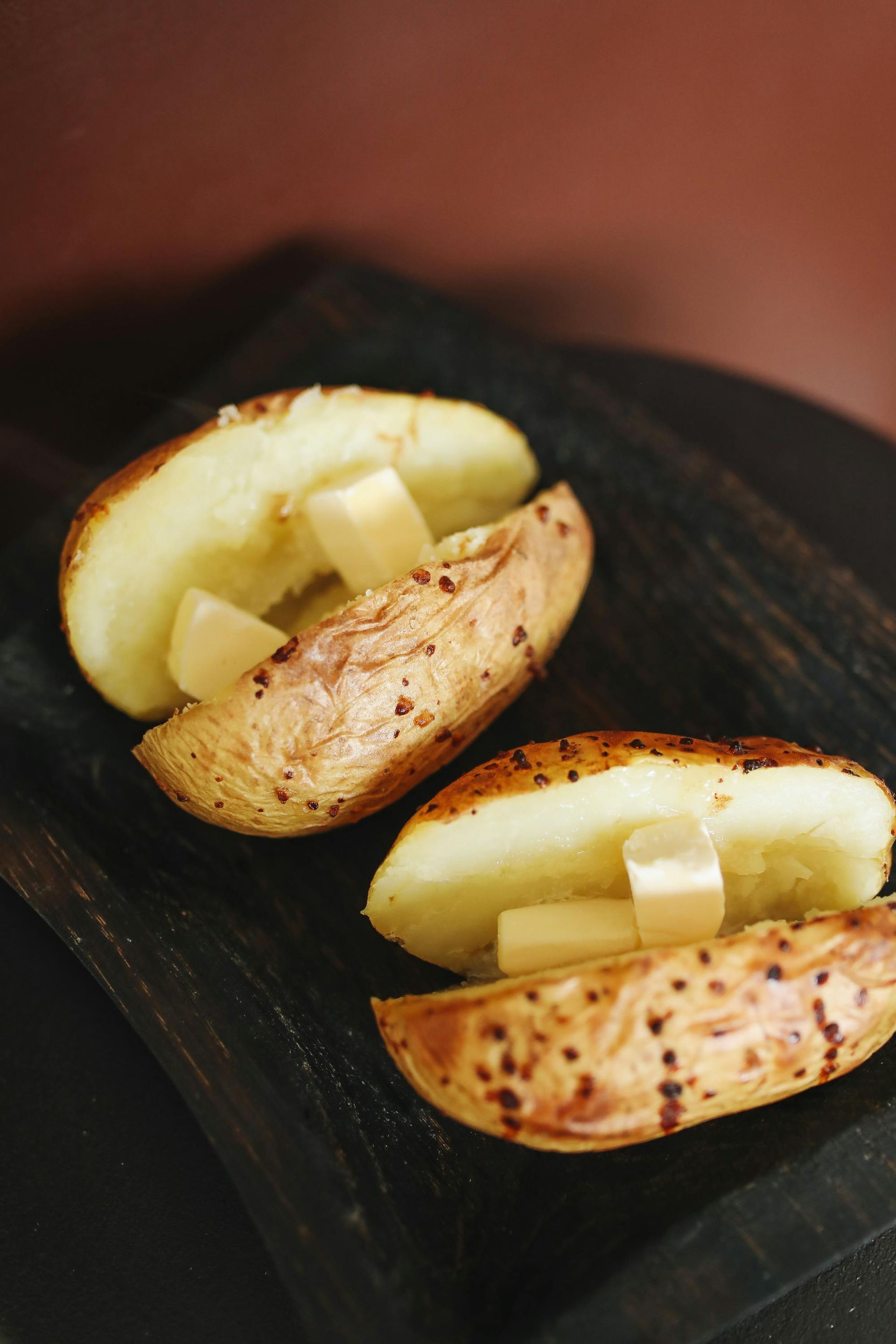 baked potatoes cut open