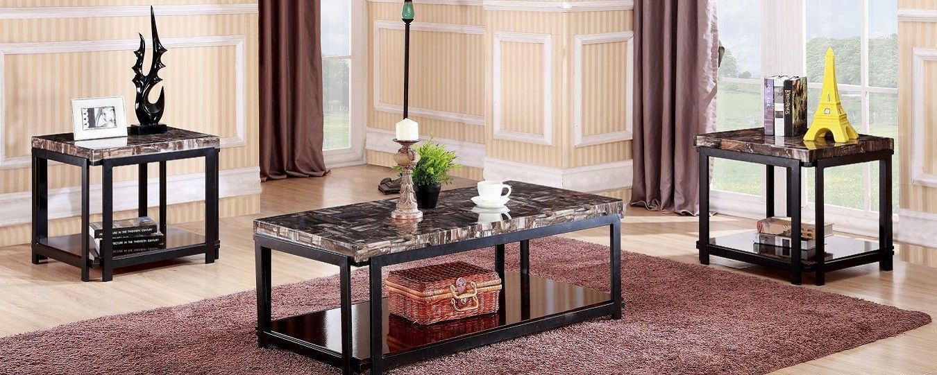 A living room with a coffee table , end tables and a rug.