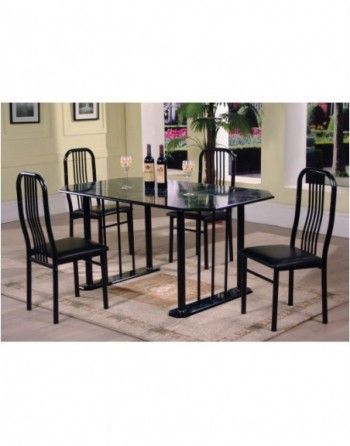 A dining room table and chairs with bottles of wine on the table.