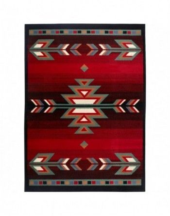 A red rug with a native american design on it