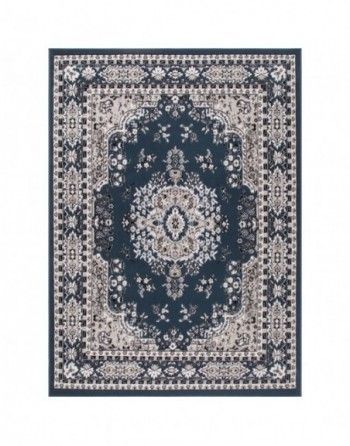 A blue and white rug with a floral pattern on a white background.