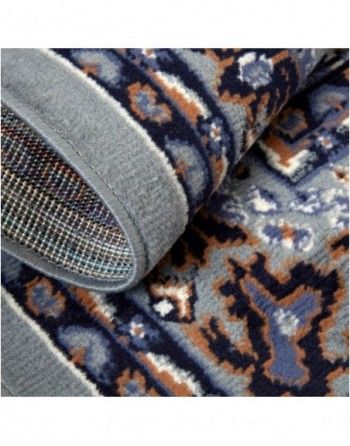 A close up of a rug with a pattern on it.