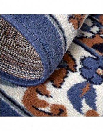 A close up of a rug with a floral pattern