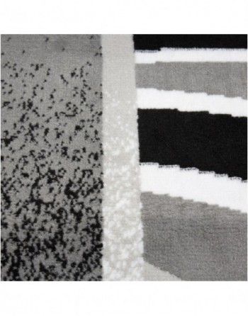 A close up of a black and white striped rug