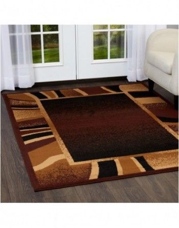 A living room with a rug and a couch