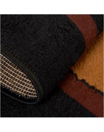 A close up of a black and brown rug with a brown border.