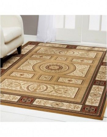 A rug is sitting on the floor in a living room next to a chair.