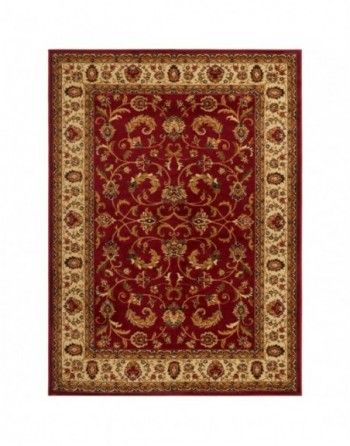 A red rug with a gold border on a white background.