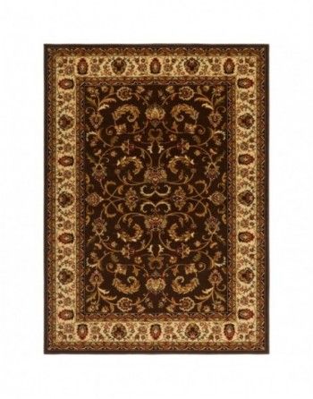 A brown rug with a floral pattern on a white background.