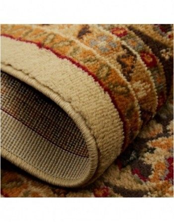 A close up of the bottom of a rug with a pattern on it.