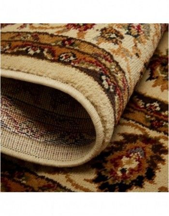 A close up of a rug with a floral pattern on it.