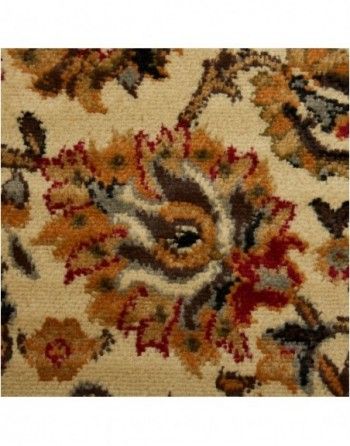A close up of a rug with a floral pattern on it.