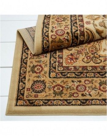 A rug with a floral pattern is laying on a table