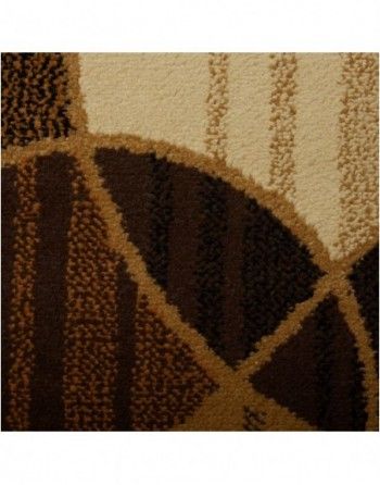 A close up of a brown and white rug with a geometric pattern