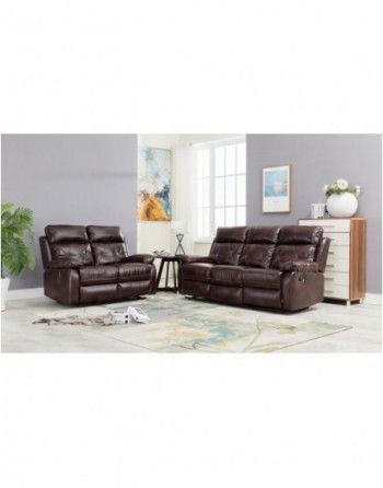 A living room with two brown leather reclining couches and a rug.