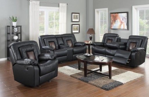 A living room filled with furniture and a coffee table.