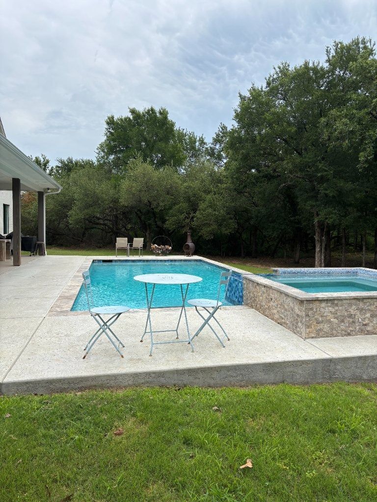 Clean backyard swimming pools maintained by BK Pool Solutions in Granbury TX