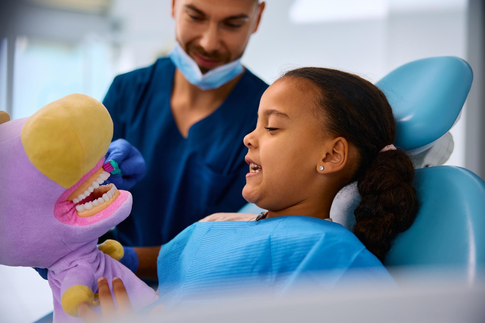 Child learning proper tooth brushing