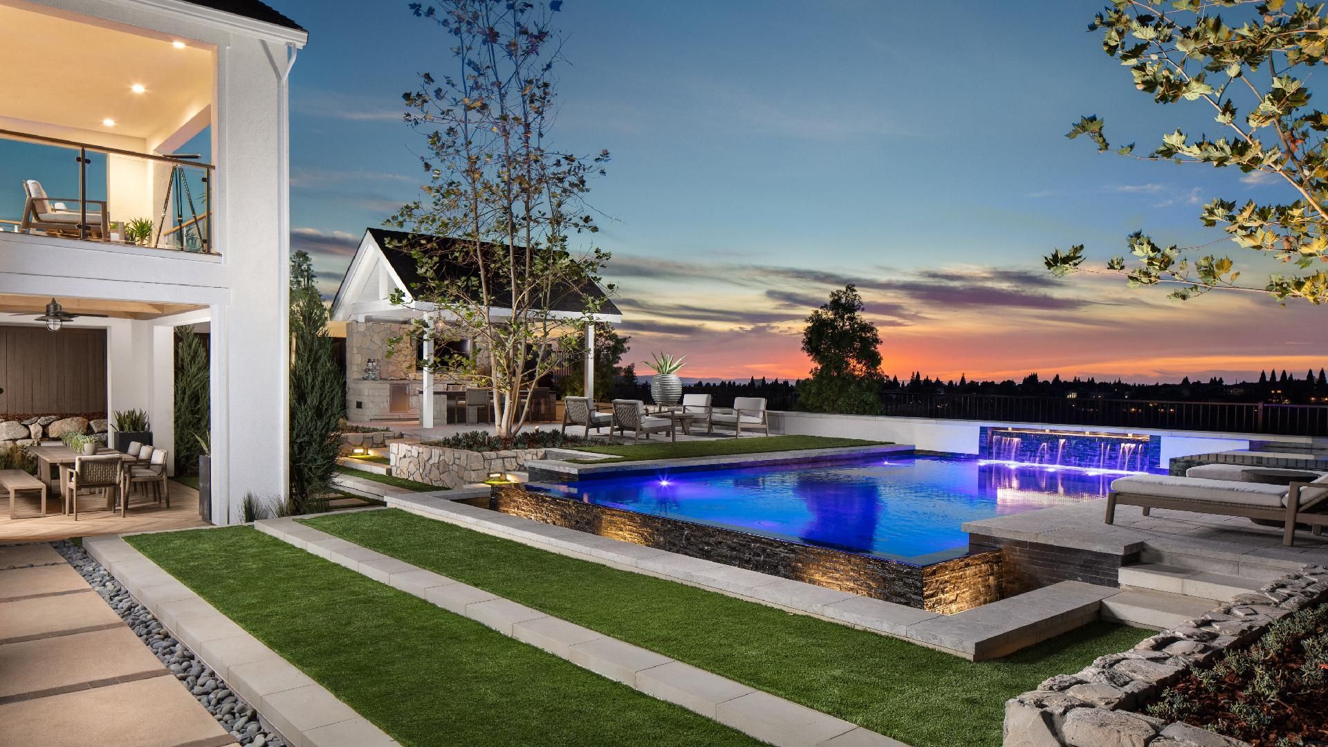 Charming large swimming pool in the backyard of a beautiful house. Work with Sonia Immers, Professional Realtor in Rocklin,CA