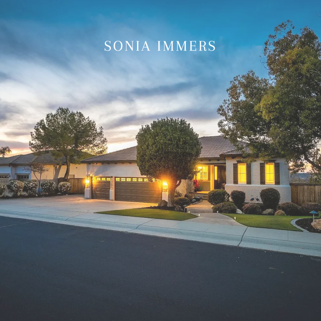 Beautiful Rocklin house lit up at sunset, perfect to sell a home in Greenbrae, Rocklin.