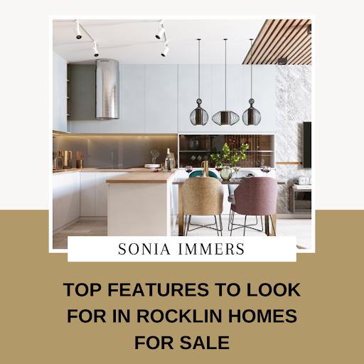 Modern kitchen with minimalist design, featuring sleek cabinetry, pendant lighting, a wooden island, and dining chairs.