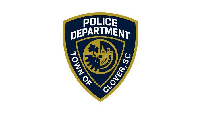 Town of Clover SC police department shield logo in navy, gold, and white