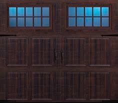 A Close up Of a Wooden Garage Door with Windows - Rochester Hills, MI - J & B Doors