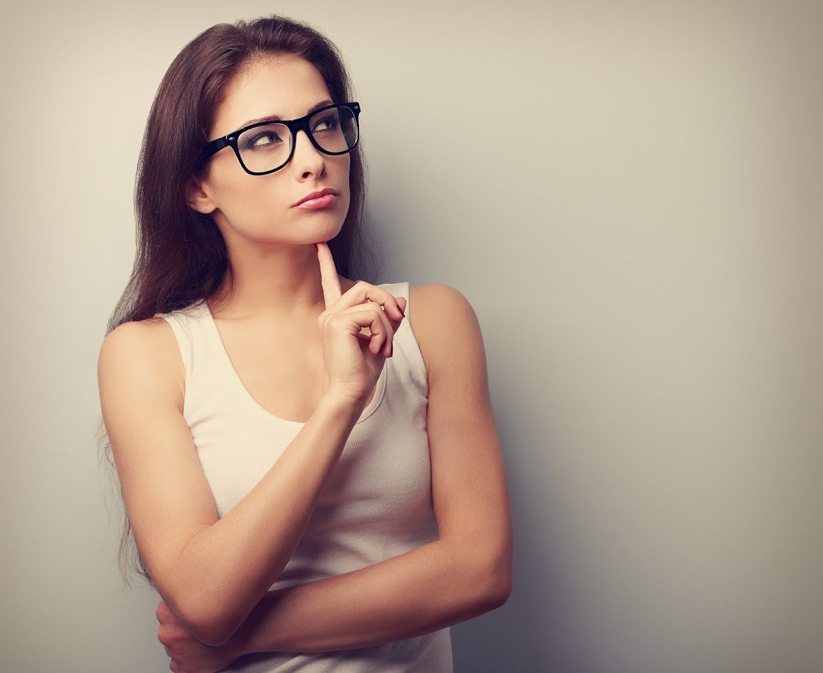 A Woman Wearing Glasses and A White Tank Top Is Thinking - Rochester Hills, MI - J & B Doors