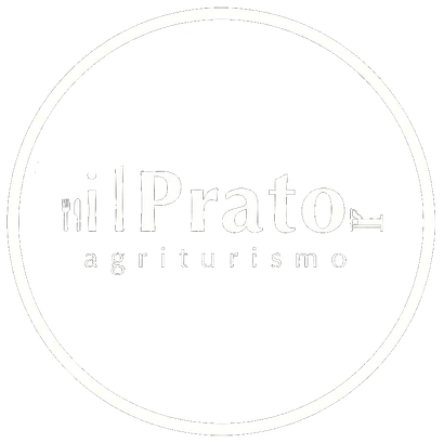 Logo circolare tenue con la scritta “il Prato agriturismo” in grigio chiaro su sfondo bianco.
