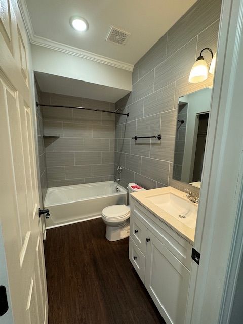 Updated bathroom with clean design and modern lighting