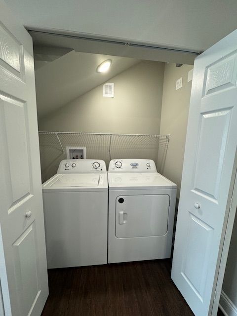Walk-in closet with built-in shelves.
