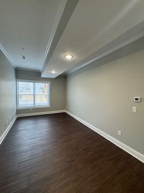 Living room interior with sleek flooring and modern ceiling lighting