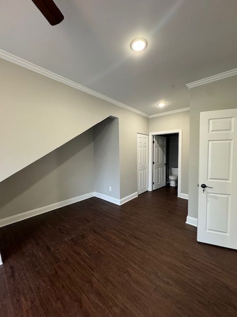 Interior lounge with neutral wall finish and spacious floor plan