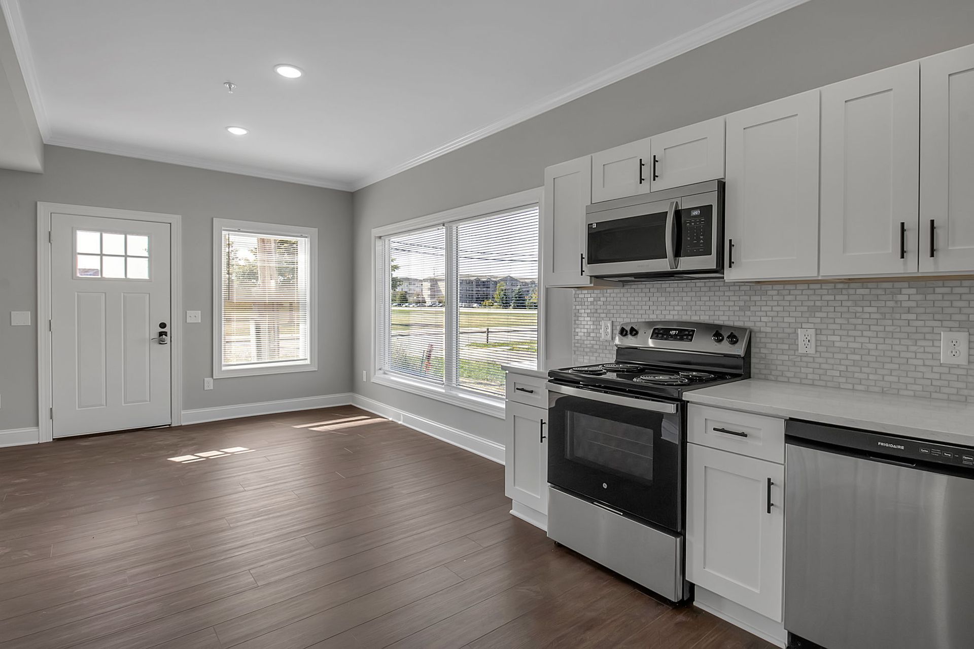 Bright kitchen with stainless steel appliances and modern finishes