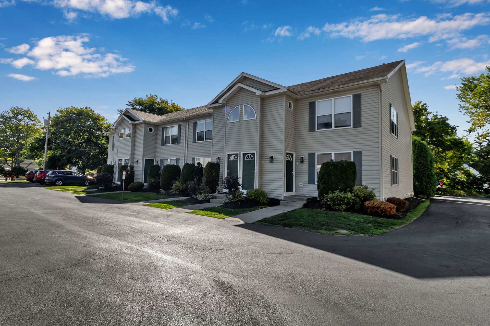 Townhome-style apartment buildings with private entrances at a Wyse Properties community in Amherst NY