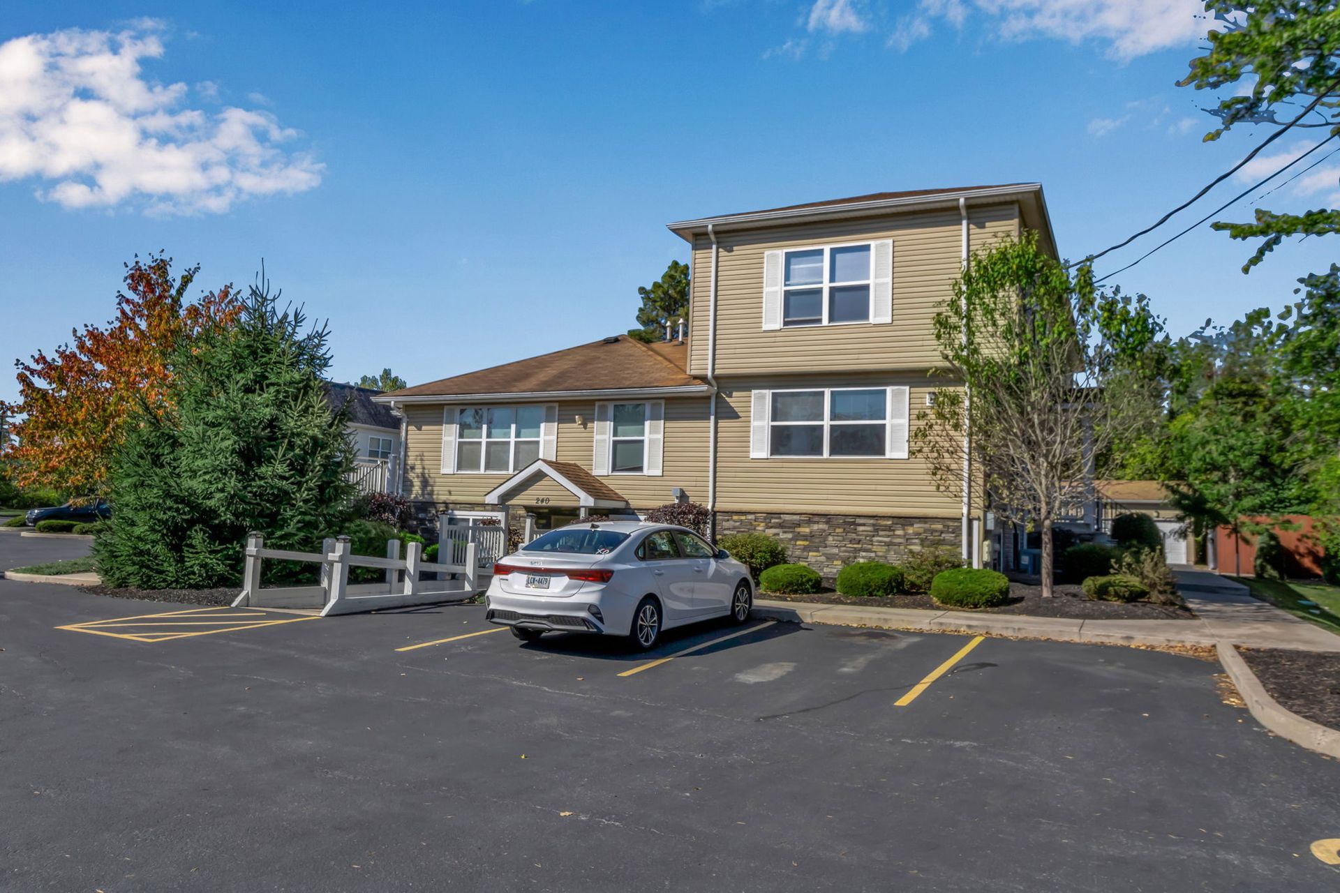 Resident parking area located beside apartment residences