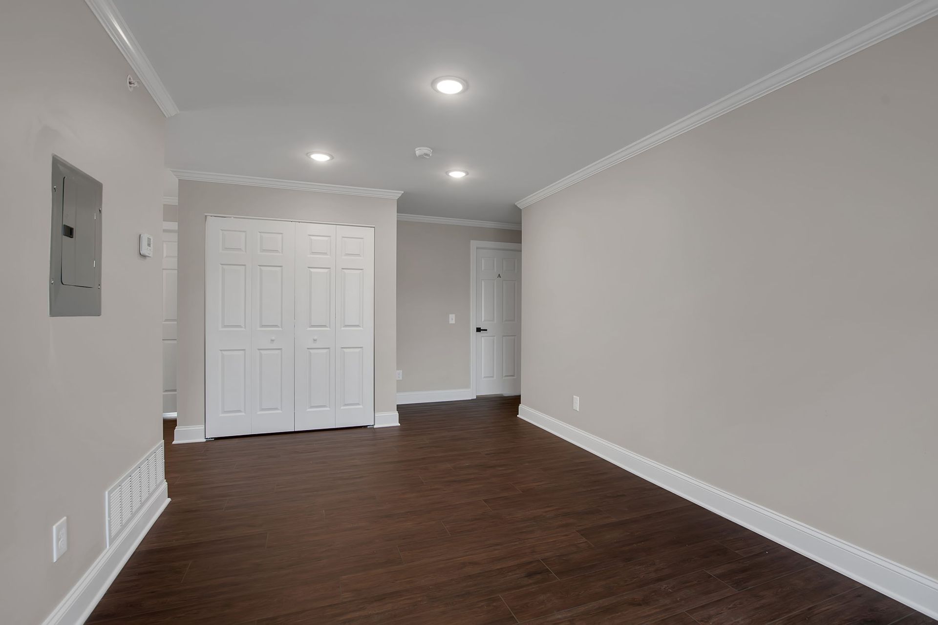 Living space featuring subtle interior lighting and modern materials