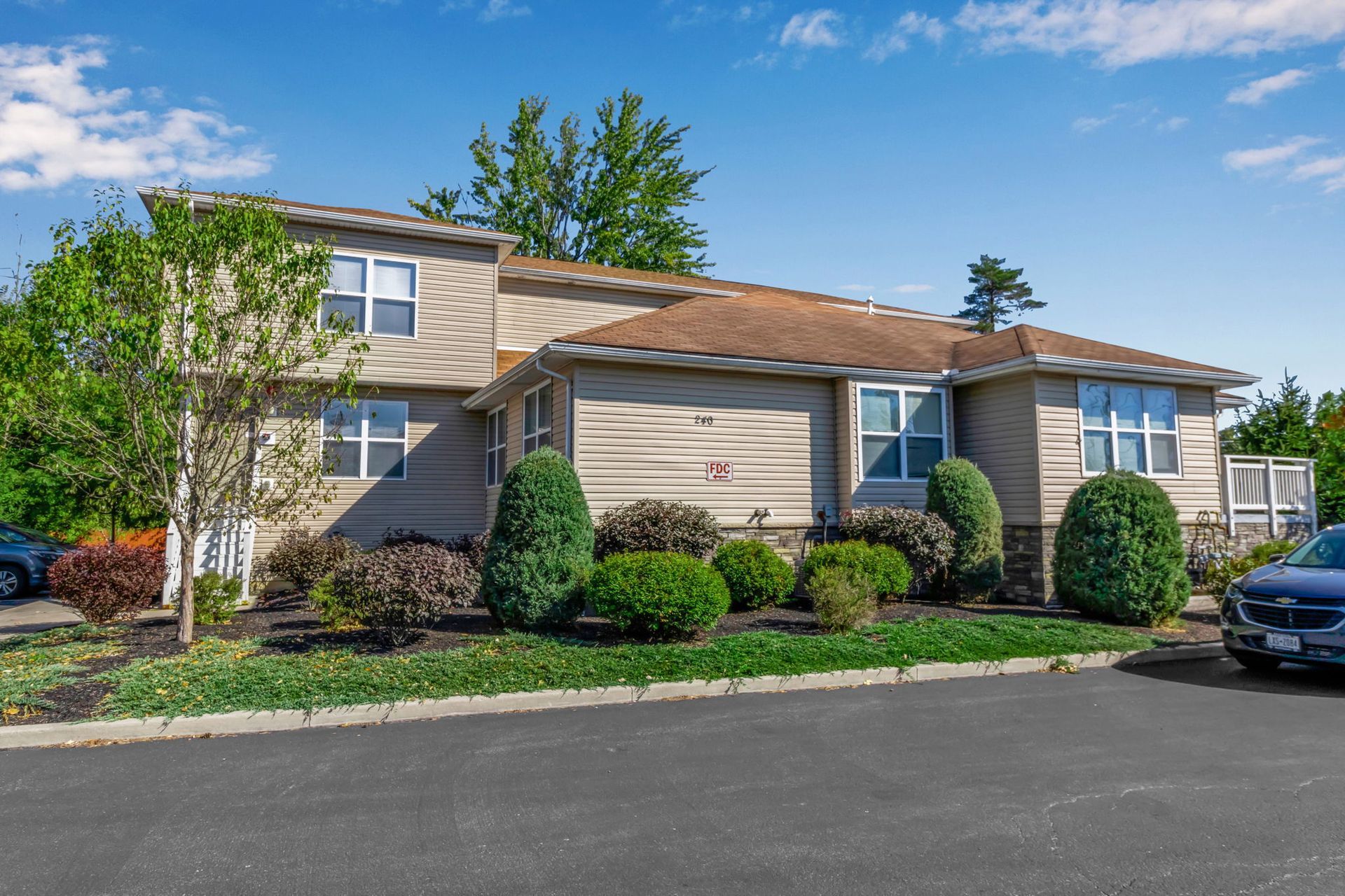 Amherst NY apartment community with green landscaping