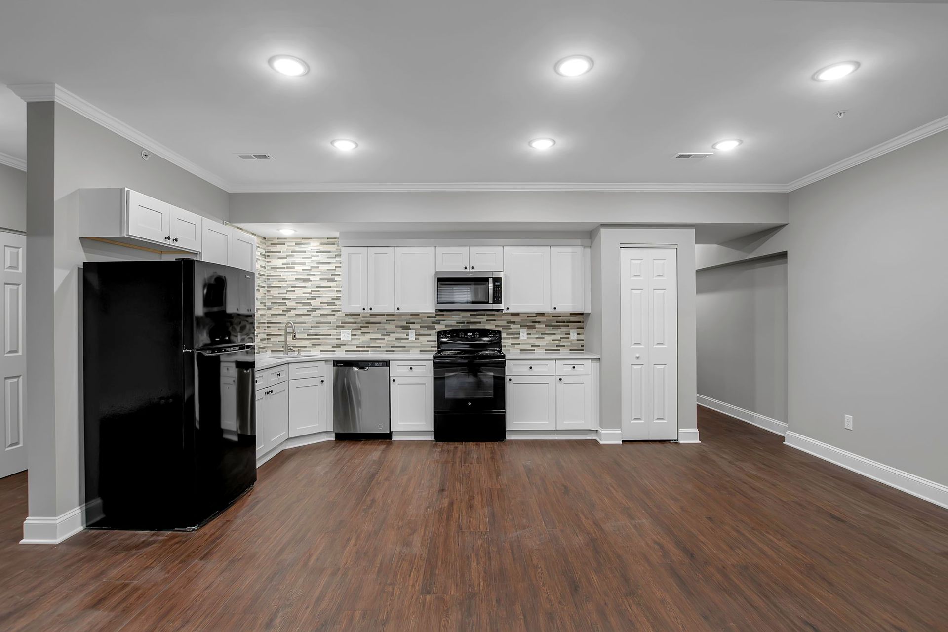 Kitchen interior showcasing modern cabinet finishes