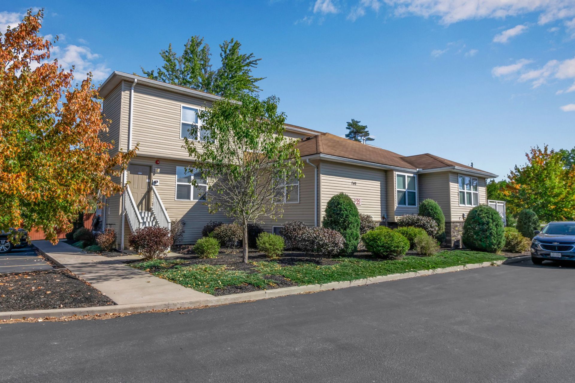 Suburban apartment community with landscaped grounds
