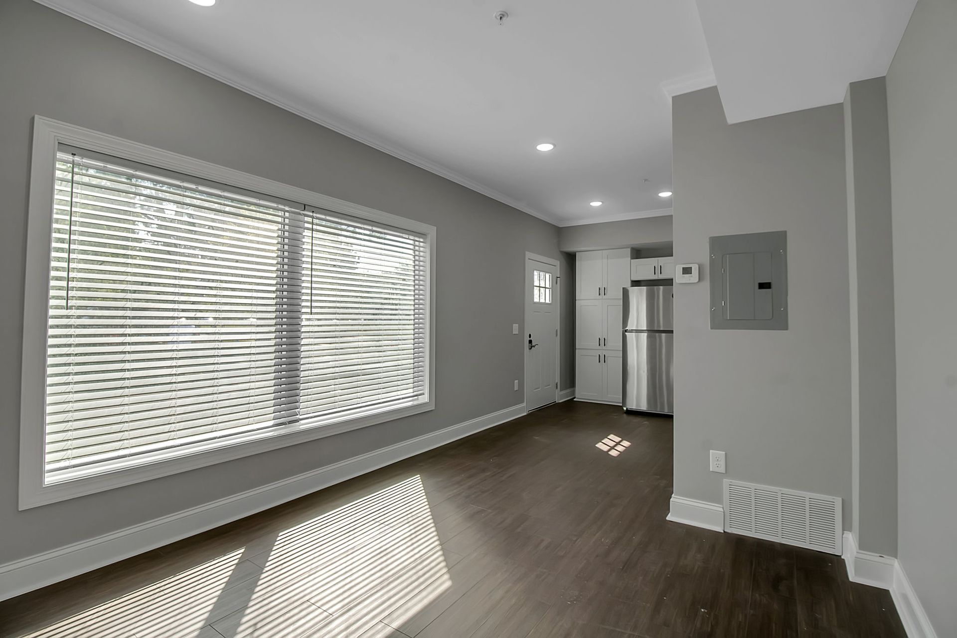 Apartment living space with open concept interior architecture