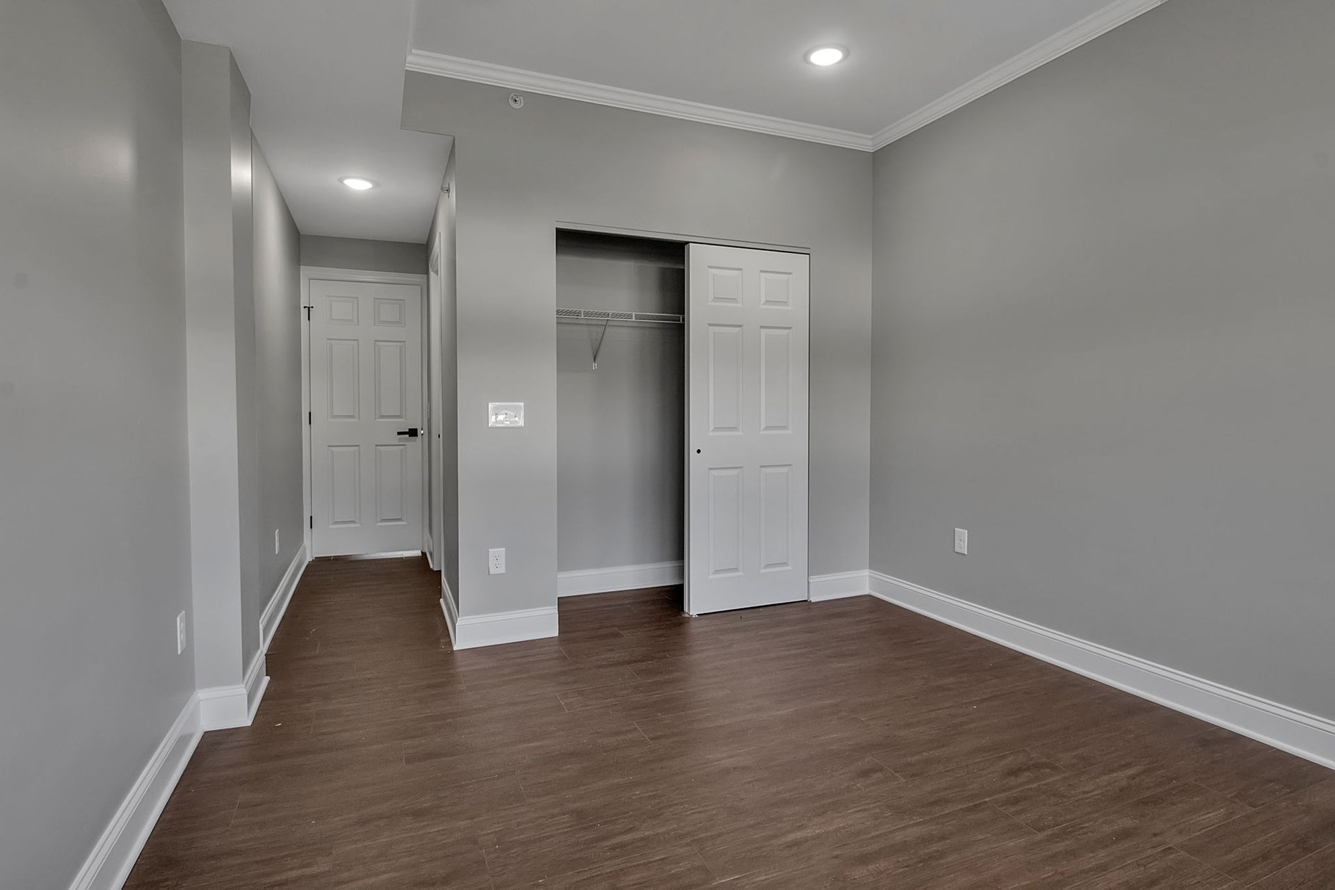 Bedroom space with updated finishes and structured layout