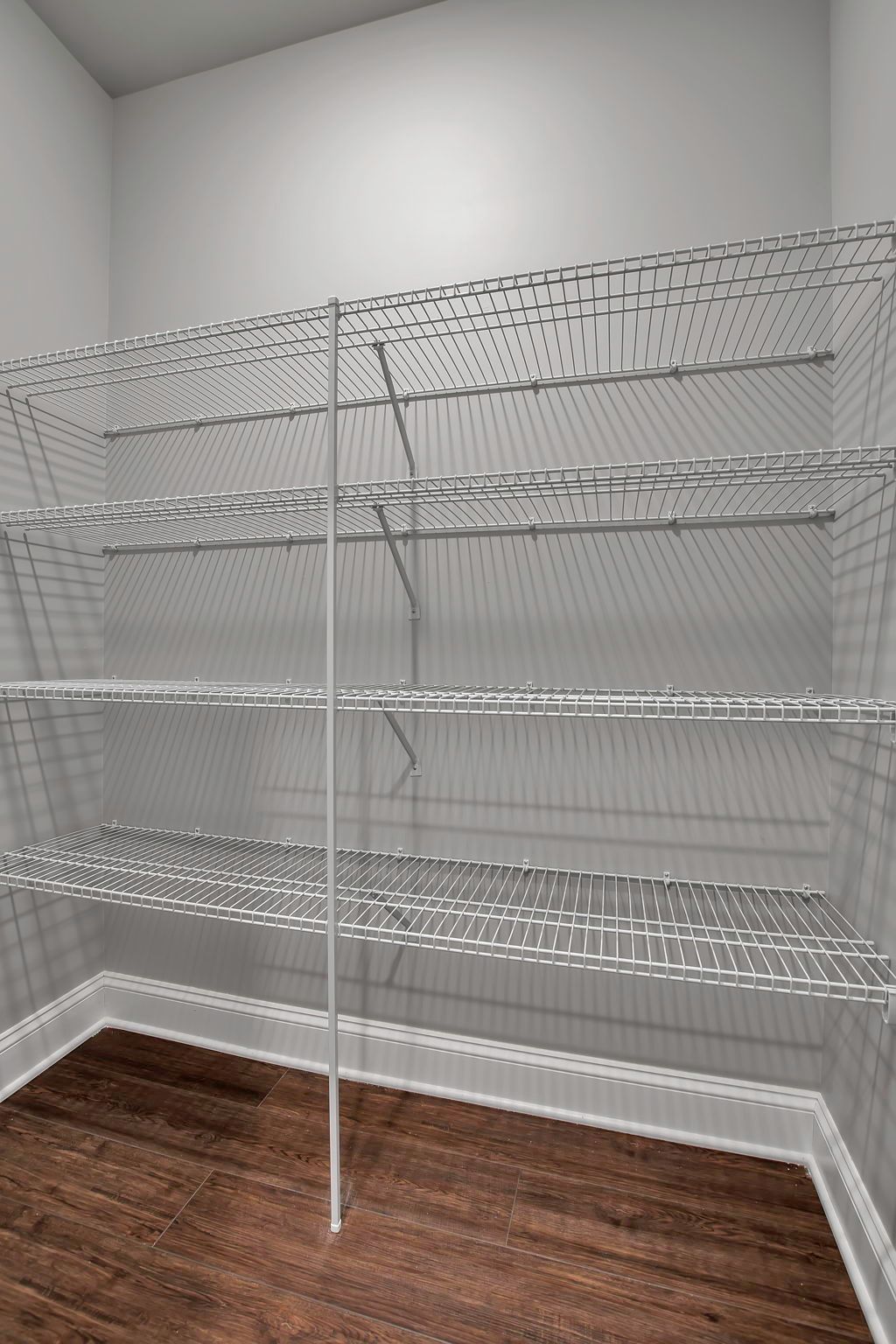Bedroom closet with built-in storage shelving