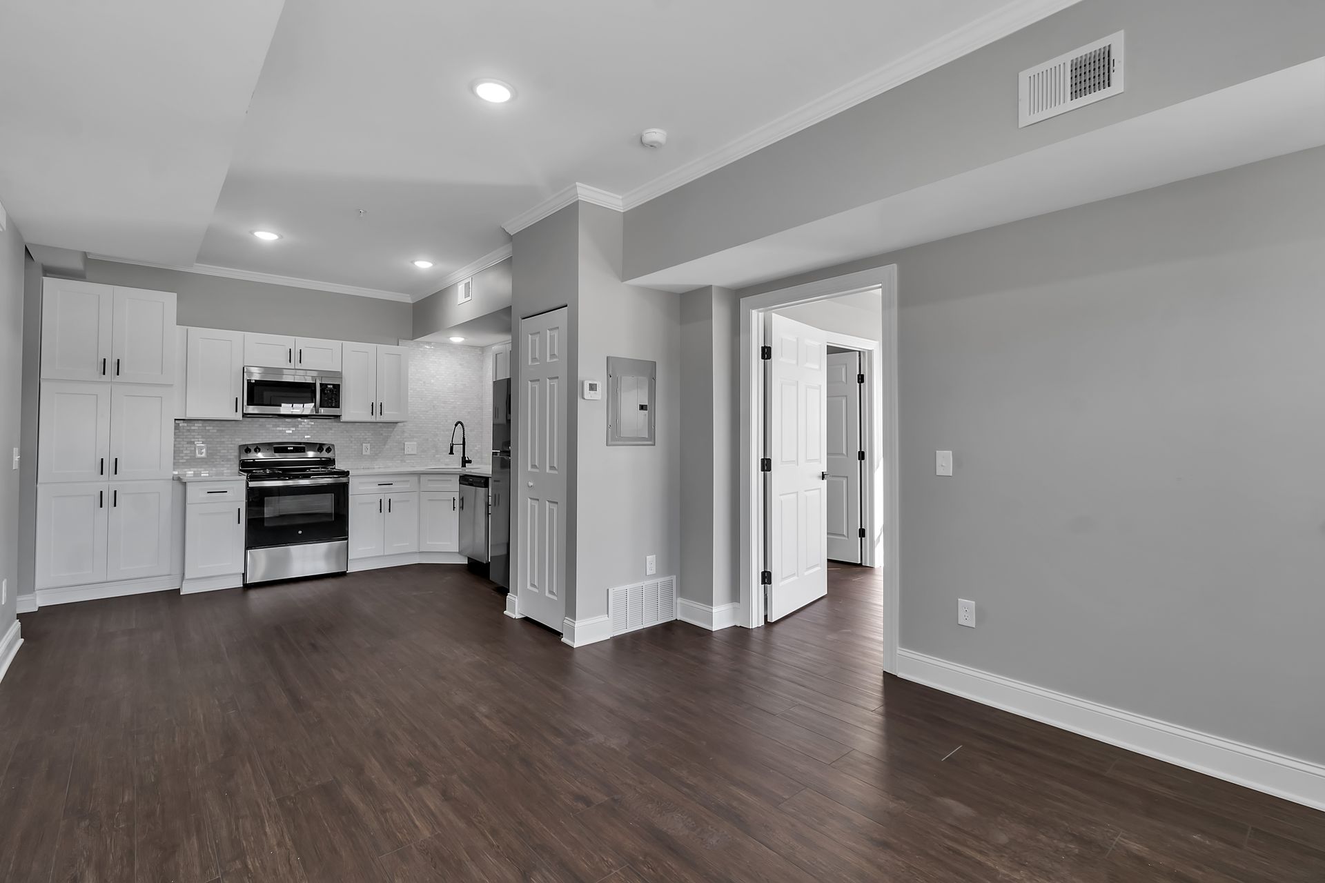 Kitchen interior with polished countertop surfaces