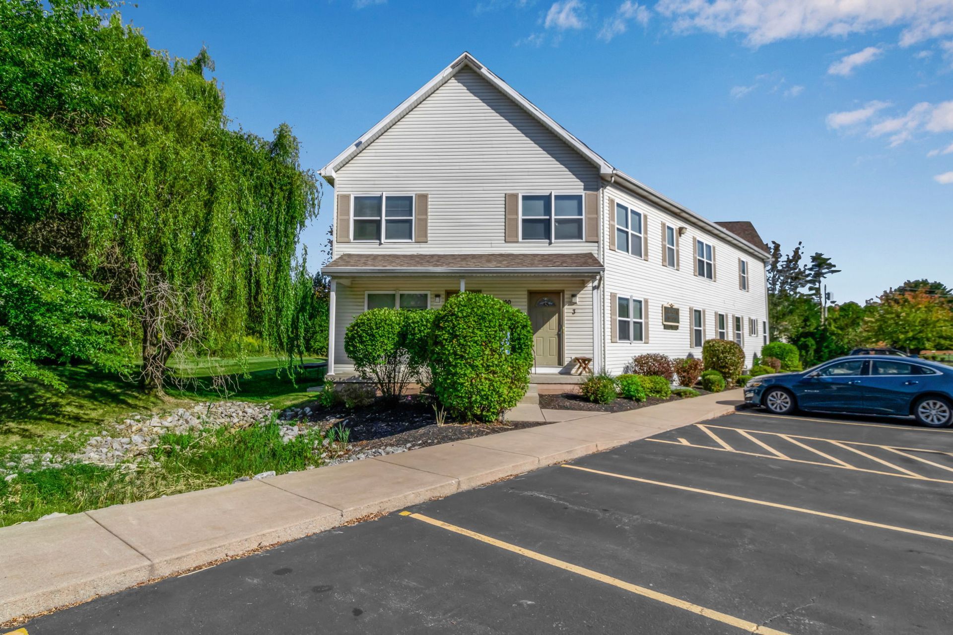 Apartment property parking area with multiple spaces