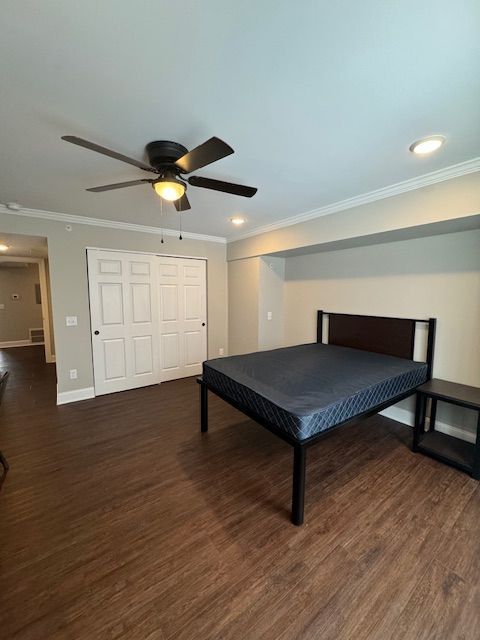 Bedroom interior featuring modern flooring and clean architectural trim