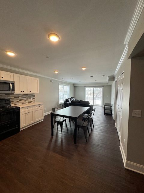 Apartment cooking area with updated cabinetry design
