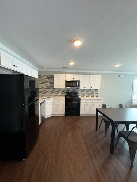Kitchen interior with contemporary cabinetry and storage space