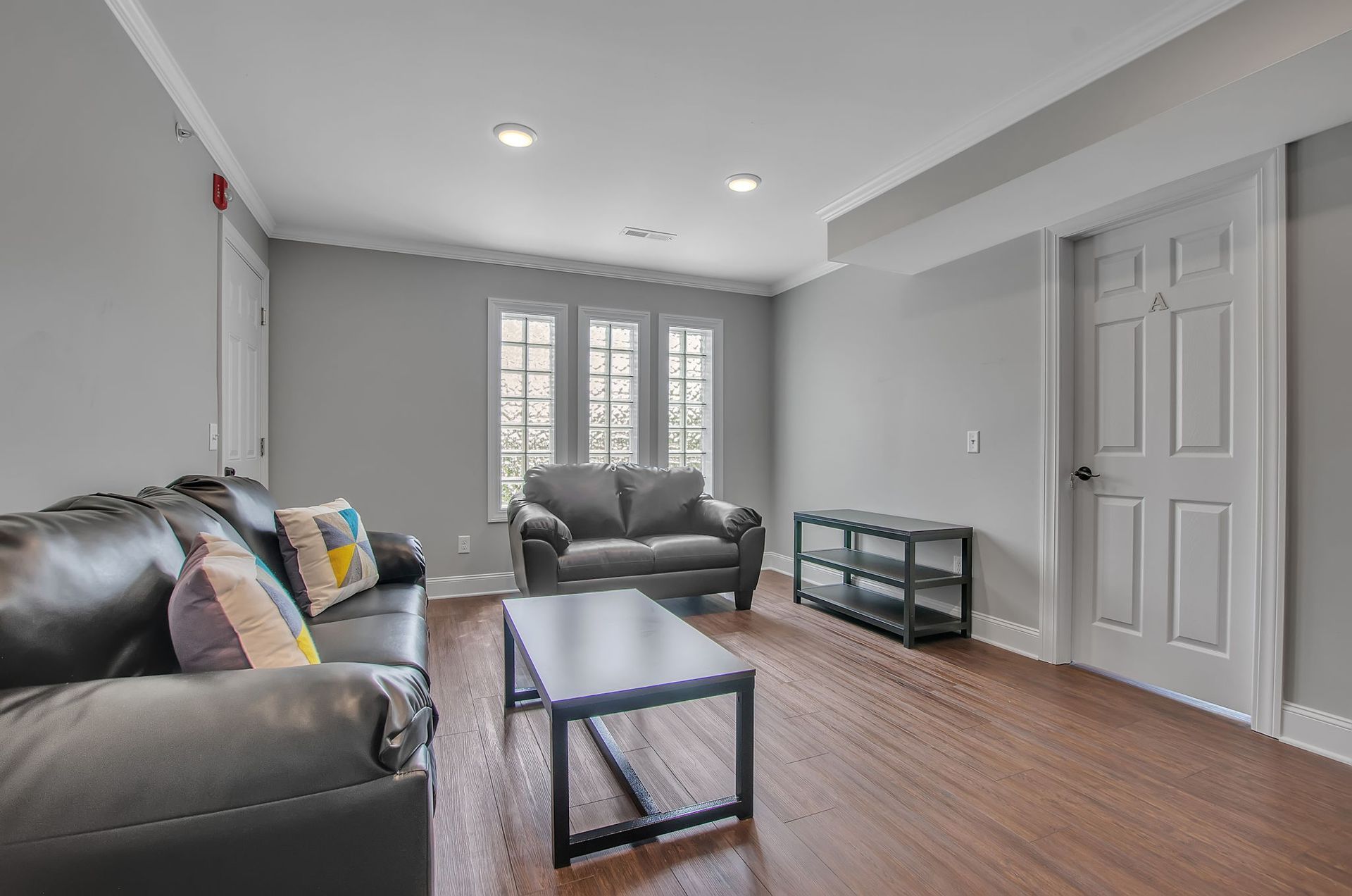 A living room with two couches and a coffee table.