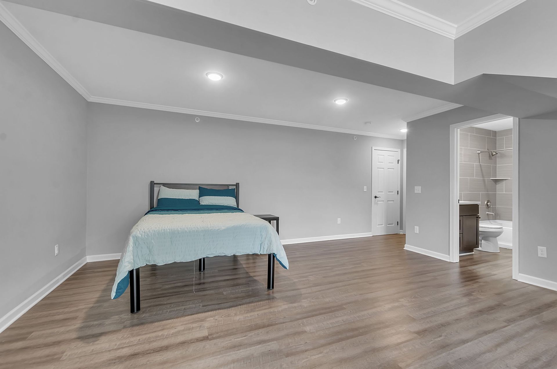 There is a bed in the middle of the room.